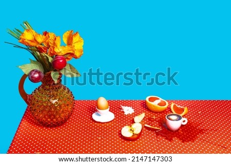 Hangover. Creative still life with flowers, fruit and retro phone isolated on bright blue red background. Vintage, retro style interior. Food pop art photography. Art, beauty, surrealism concept