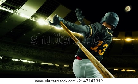 Powerful hit. Poster with baseball player with baseball bat in action during match in crowed sport stadium at evening time. Sport, win, winner, competition concepts. Collage, flyer for ad, text Royalty-Free Stock Photo #2147147319