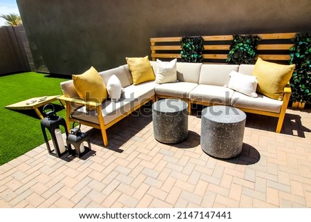 Rear Yard Patio With L-Shaped Furniture