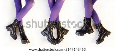 Legs of a beautiful young girl in lilac tights. Black leather lace-up boots. Fashionable, stylish collection of women's shoes.