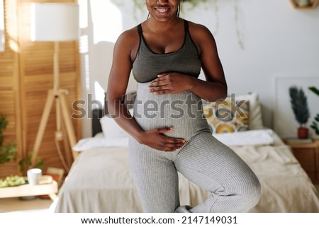 Pregnant girl meditating at home