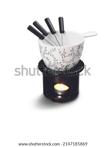 Black and white fondue kit with leafs print, isolated
