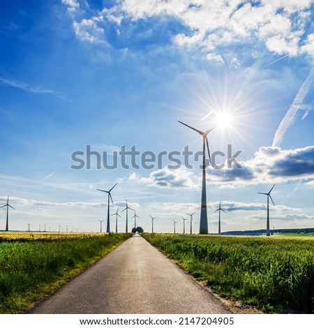 Windpark in an agricultural area in the middle of Germany, North Rhine-Westphalia near Bad Wuennenberg Royalty-Free Stock Photo #2147204905