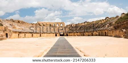 The ruins of the ancient Roman arena Uthina, near the settlement of Oudna, Tunisia. Royalty-Free Stock Photo #2147206333
