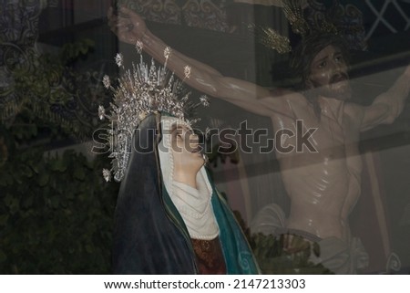 double image of the virgin mary and crucified jesus
