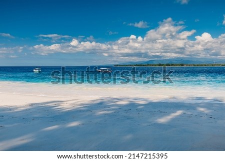 Holiday beach with white sand and turquoise sea water