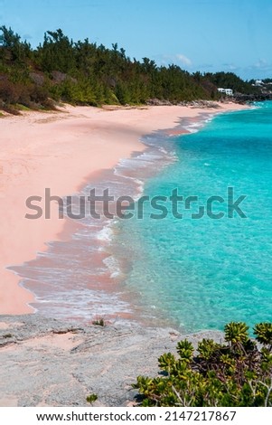 A scenic view with pink sands beach and blue ocean waves of Horse Shoe Bay in South Hampton, Bermuda Royalty-Free Stock Photo #2147217867