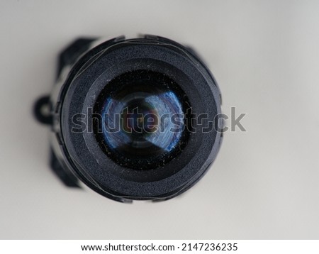 Surveillance camera on a gray background. Closeup. The concept of covert surveillance Royalty-Free Stock Photo #2147236235