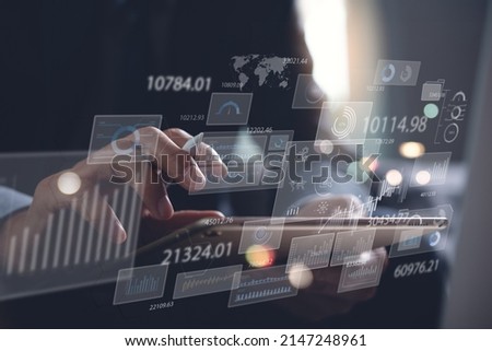 Data analysis, business analytics concept. Businessman working on digital tablet with financial graph, economic growth chart, big data on virtual screen, digital marketing, data scientist Royalty-Free Stock Photo #2147248961