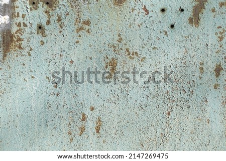
Iron, colored and rusty texture. Shabby metal surface in full screen.