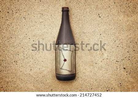 Vintage version of washed out bottle on a gravel beach, with envelope and seal on  label
