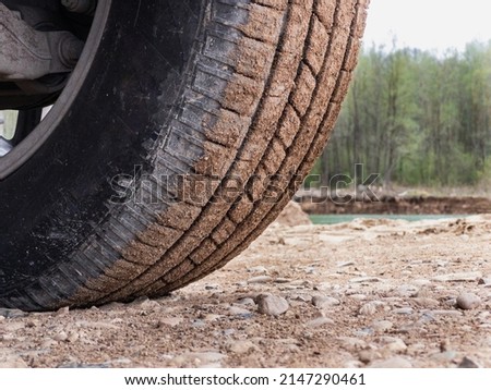 Muddy SUV All-terrain Offroad tires Royalty-Free Stock Photo #2147290461