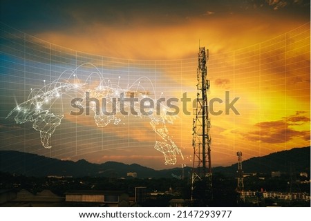 Telecommunication tower during sunset with HUD graphical internet worldwide connectivity of 3G, 4G and 5G network. Technology concept. Antenna, microwave, repeater, base station. Mobile communications Royalty-Free Stock Photo #2147293977