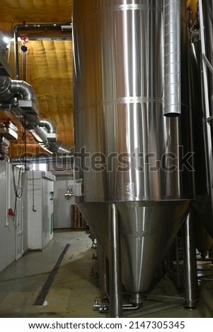 Photo of large stainless steel tanks for beer production