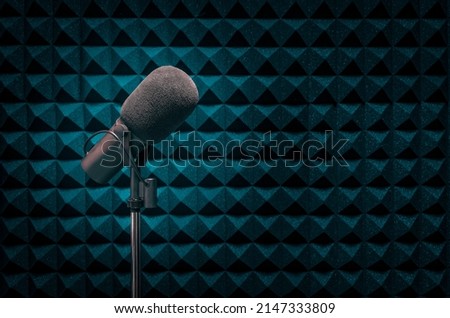 Professional microphone in radio station studio background Royalty-Free Stock Photo #2147333809