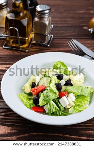 fresh salad with cheese and olives