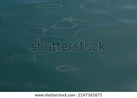 Sea ​​water, greenish bluish abstract background.  Royalty-Free Stock Photo #2147365875