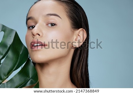brunette natural pure skin exotic green leaf isolated background