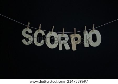Word Scorpio on Black background. Astrological sign. Scorpio is the eighth astrological sign in the zodiac