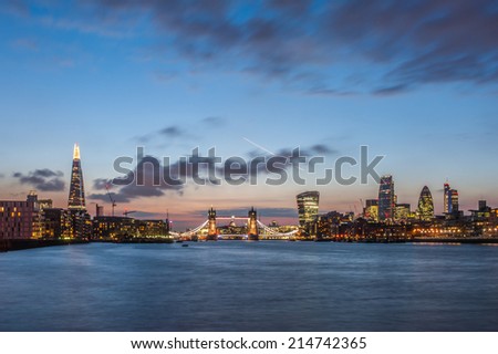 The new London skyline at night with The Shard, Tower Bridge and the new skyscrapers of The City. 