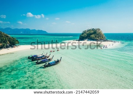 Aerial view from drone of "Thale Waek" (Separated Sea) in Krabi Thailand" This is called the Koh Dam group after its two large members, Koh (island) Dam Hok and Koh Dam Kwan. Royalty-Free Stock Photo #2147442059