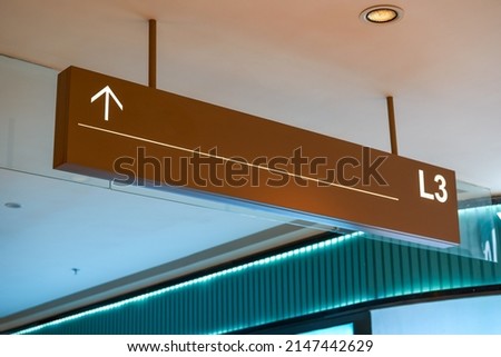 Close-up of a sign in a shopping mall