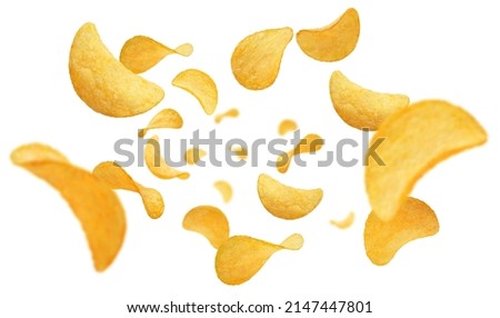 Flying potato chips, isolated on white background Royalty-Free Stock Photo #2147447801