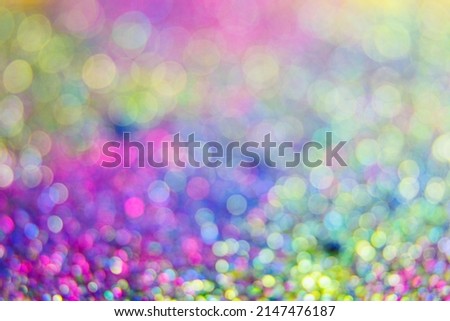 Defocused abstract vivid rotating background with turquoise bokeh. Luxurious abstract loop background, Trendy Iridescent Background Design. selective focus