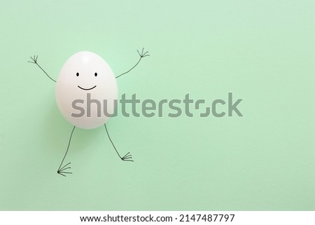 Egg with funny face drawn