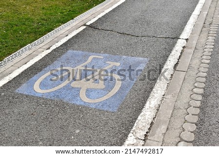 Bike lane between a green area and the sidewalk in Bucharest, Romania