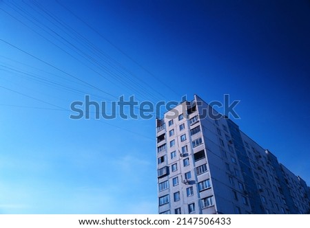 Right aligned house with communication wires backdrop