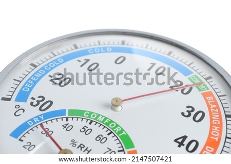 Round mechanical hygrometer on white background, closeup. Meteorological tool Royalty-Free Stock Photo #2147507421