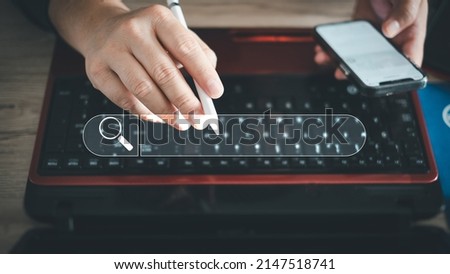 Data Search Technology Search Engine Optimization. man's hands are using a computer keyboard to Searching for information. Using Search Console with your website.