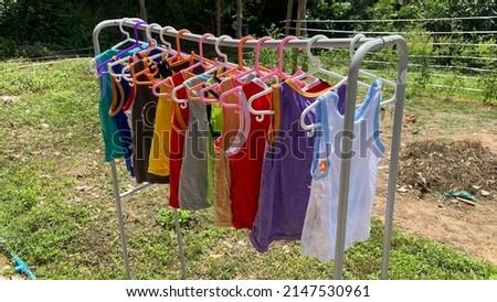 Drying colorful children's tank tops