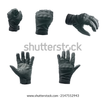 Black motorcycle gloves isolated on a white background. Royalty-Free Stock Photo #2147552943