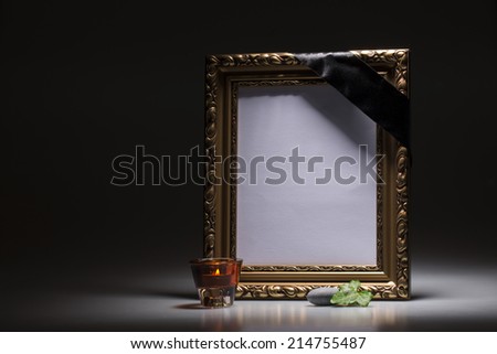 blank mourning frame with leaf and candle light