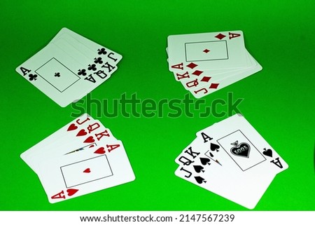 playing cards isolated with colored backgrounds
