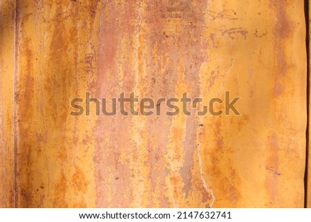 
Iron, colored and rusty texture. Shabby metal surface in full screen.