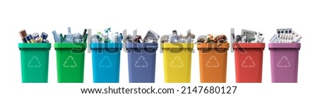 Collection of waste bins full of different types of garbage, recycling and separate waste collection concept Royalty-Free Stock Photo #2147680127