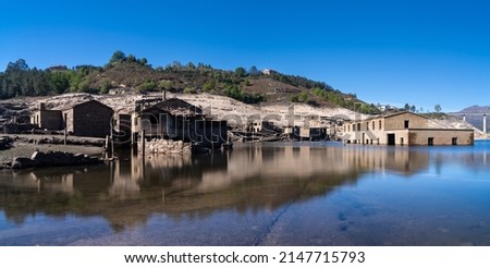 A long exposure view of the ghost town of Aceredo in the Alto Lindoso reservoir