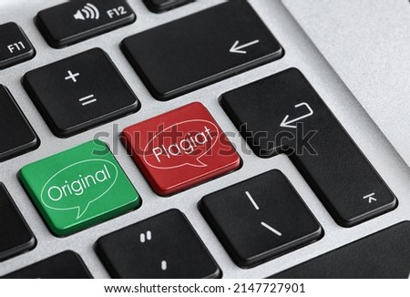 Color buttons with words Plagiat and Original on keyboard, closeup view Royalty-Free Stock Photo #2147727901