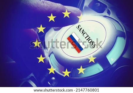 Human hand pushing the button "Sanctions" , with the European Flag and Russian Flag. Concepts of Sanctions to Russia against Ukraine War 2022 Royalty-Free Stock Photo #2147760801