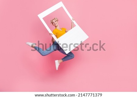 Full size photo of casual wear woman jumping relaxing on summer weekend isolated on pink color background