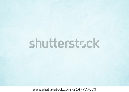 Pastel blue and white concrete stone texture for background in summer wallpaper. Cement and sand wall of tone vintage. Concrete abstract wall of light cyan color, cement texture mint green for design. Royalty-Free Stock Photo #2147777873