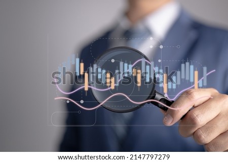 Analytical data and development statistics. Web analytics and product testing techniques are being measured. A guy studies an SEO dashboard and a digital report. Royalty-Free Stock Photo #2147797279