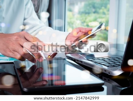 The businessman is working with a computer laptop and mobile phone. With a blank search bar, the notion is Search engine Browsing Internet Data Information. SEO Networking for Search Engines