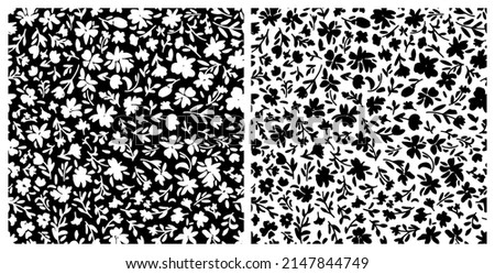 Set of botanical seamless repeat pattern. Random placed, vector flowers with leaves all over surface print in black and white. Royalty-Free Stock Photo #2147844749