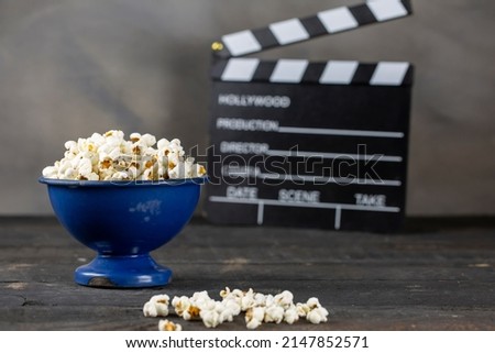 Movie Clapper Board and Popcorn	