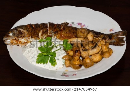 Fried trout with mushroom on a dish Royalty-Free Stock Photo #2147854967