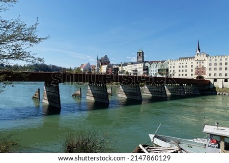 Bridge over the river Inn, with the city view of Wasserburg am Inn. Royalty-Free Stock Photo #2147860129